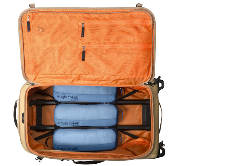 Eagle Creek Pack-It™  Slim Cube M/M/M Set example in a Rolling suitcase | Blue Dawn