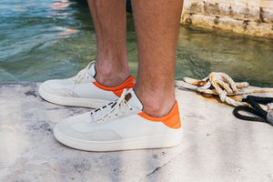 OluKai Men’s Pūnini Sneaker | Off White Molten Orange