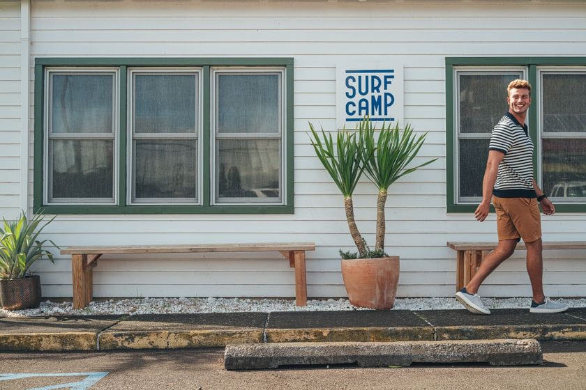 OluKai Men’s Pūnini Sneaker | Off White Molten Orange