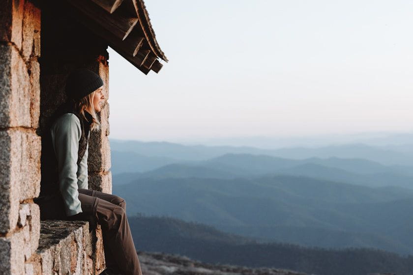 XTM Women's Milanesia 1/4 Zip Neck Seawool Fleece worn under a puffy fleece